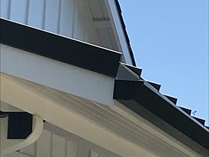 Black fascia with black round downspout, Fullerton, CA